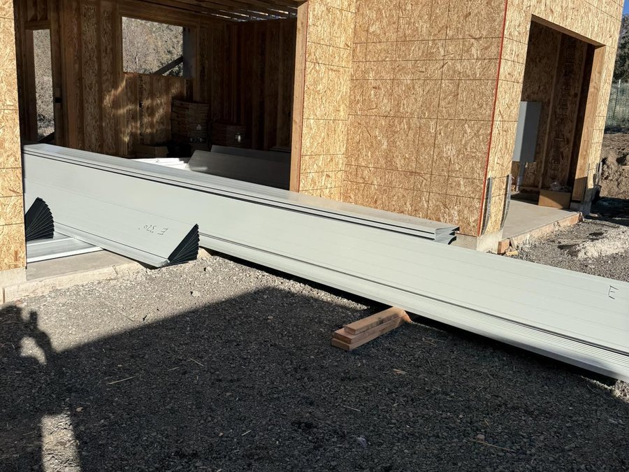 Panels delivered to a house under construction