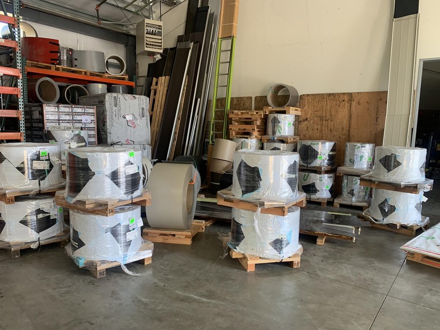 Coil stock pallets staged in the Caliber shop